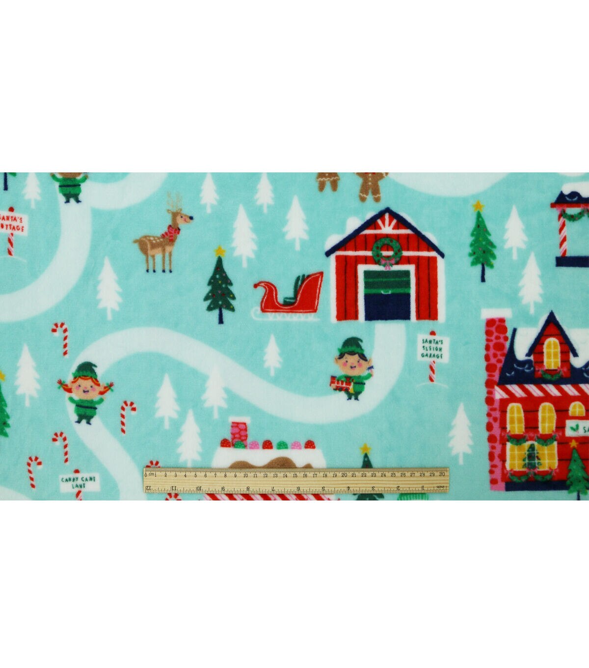 North Pole Village on Blue Sew Lush Fleece Fabric by POP!